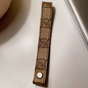 Gucci key fob.